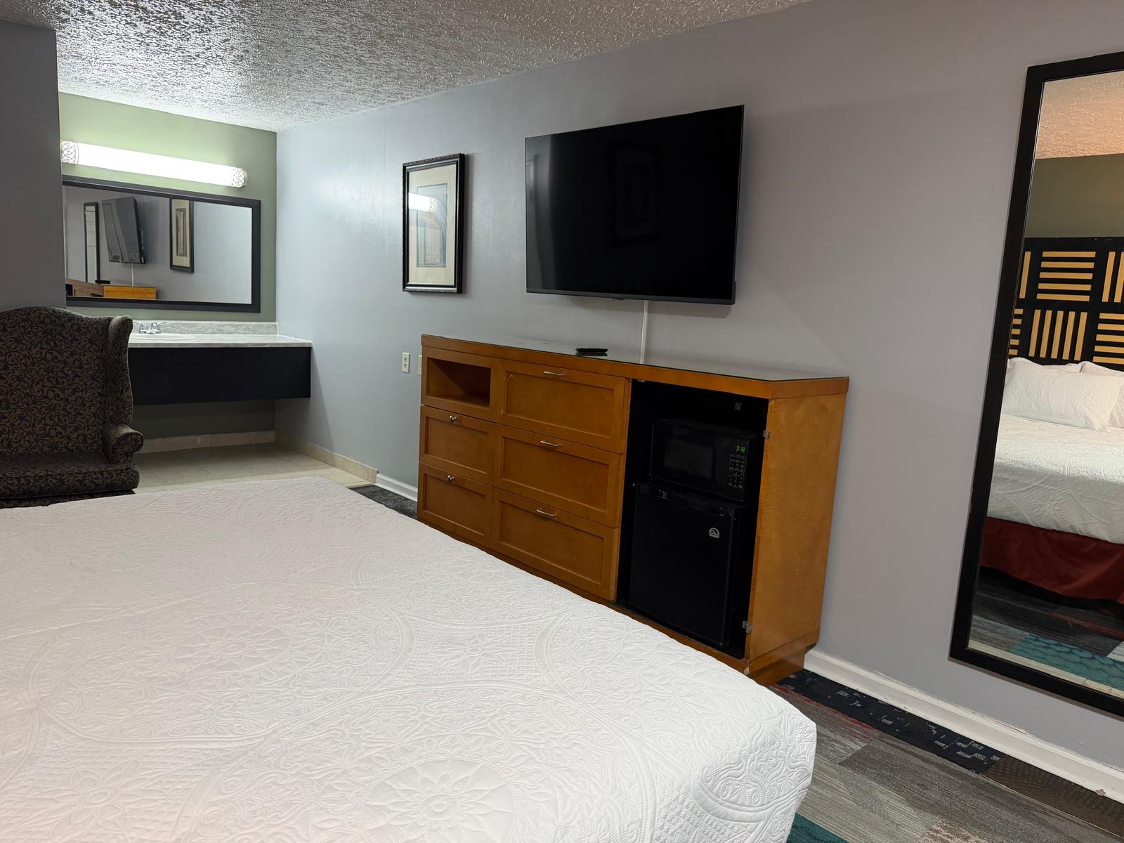 King room flat screen TV and dresser Motel M Lewisburg